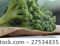 Bunch of fresh green broccoli on wooden background 27534835
