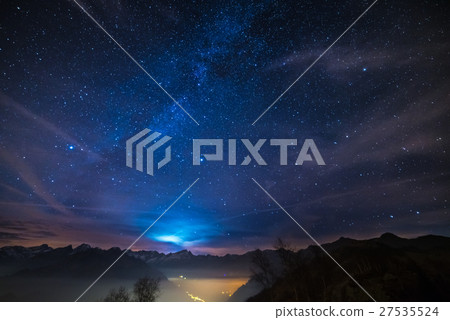 Night on the Alps under starry sky and moonlight 27535524