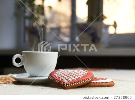 Cup of coffee with cookies  Cup of coffee with cookies  27538963