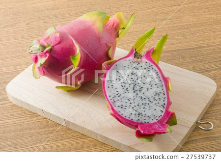 Fresh Ripe Dragon Fruit on Cutting Board 27539737