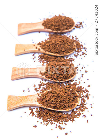 Instant coffee in wooden spoon on white background 27543024