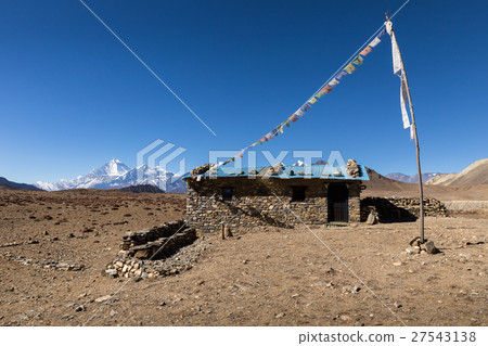 stone house with colored flags stone house with colored flags 27543138