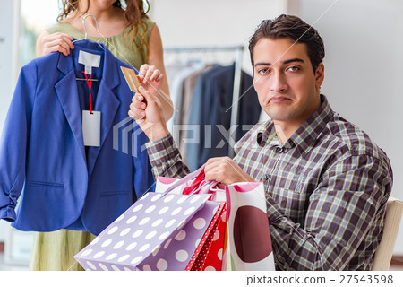 Man getting into debt due to shopping 27543598