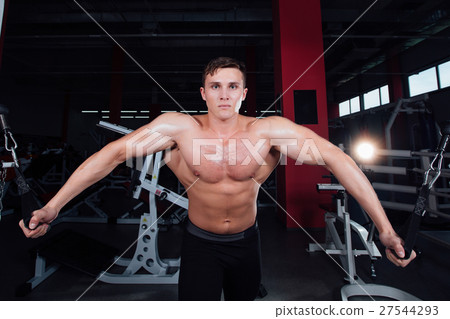 big strong bodybuider without shirts demonstrate 27544293