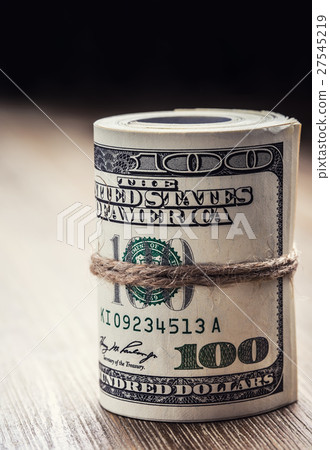Dollar banknotes rolled in other positions. 27545219