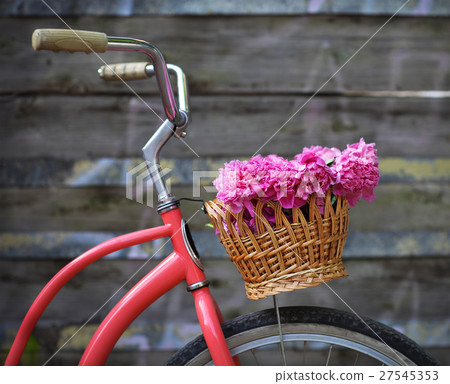 Vintage bicycle with basket with peony flowers Vintage bicycle with basket with peony flowers 27545353