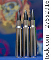 Bullets and skull background 27552916