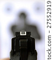 Aiming gun at target 27552919