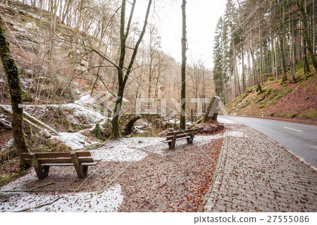 an Bench in snow 27555086