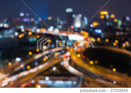 Abstract blurred light highway intersection Abstract blurred light highway intersection 27558956