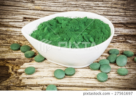 Spirulina,chlorella supplement powder and pills in 27561697