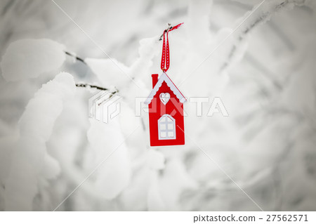 Cardboard house in red on snowy bush  27562571