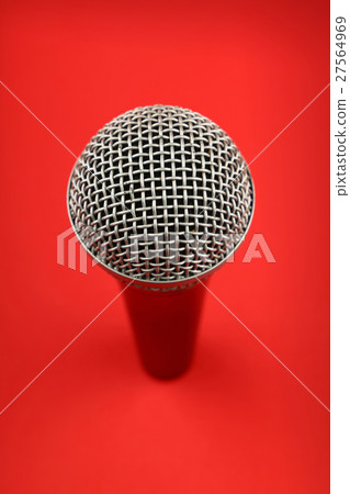 Microphone high angle close up over red 27564969