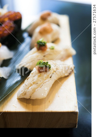 Engawa aburi sushi on wooden plate 27571634