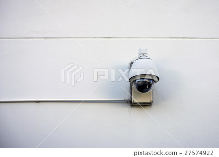 Security camera on concrete wall Security camera on concrete wall 27574922