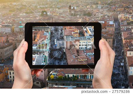 tourist photographs street in Bologna city 27579286