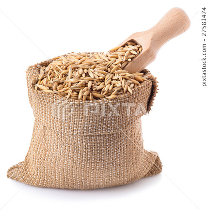 grain oats in bag with a wooden scoop isolate grain oats in bag with a wooden scoop isolate 27581474