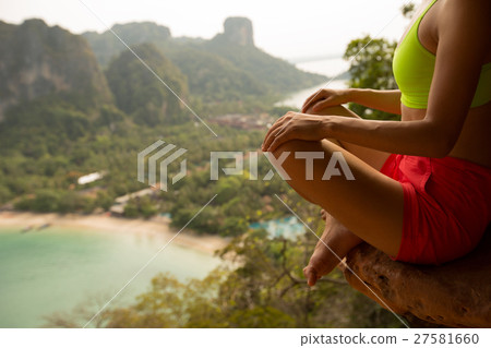 fitness woman practice yoga at mountain peak cliff fitness woman practice yoga at mountain peak cliff 27581660