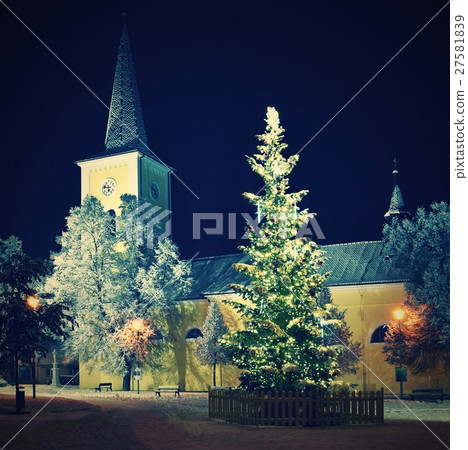 Night Christmas tree with church and snow. 27581839
