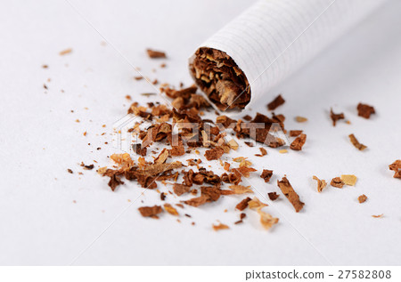 Cigarette isolated on a white background Cigarette isolated on a white background 27582808
