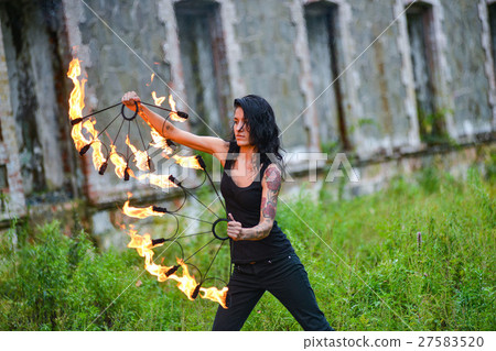 fire show on the shore of the sea 27583520