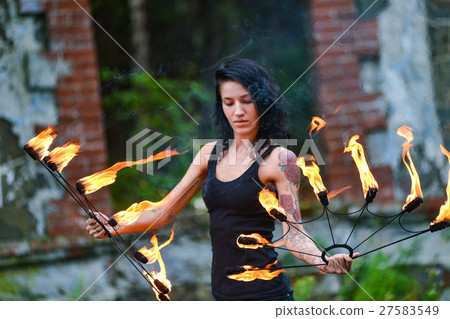 fire show on the shore of the sea 27583549