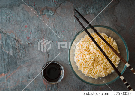 Soup Ramen noodles in glass bowl and wooden sticks 27588032