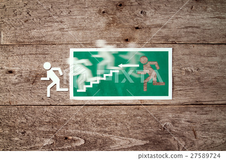 Exit sign with running man figure Exit sign with running man figure 27589724