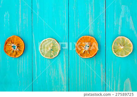 Four dry slices of orange and lemon Four dry slices of orange and lemon 27589725