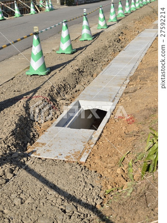 Road side grooves under construction 27592214