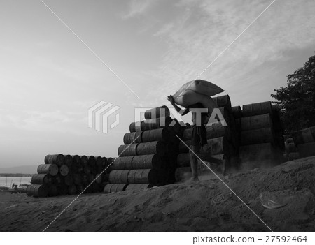 WORKER CARRYING SACKS ON SHOULDER WORKER CARRYING SACKS ON SHOULDER 27592464