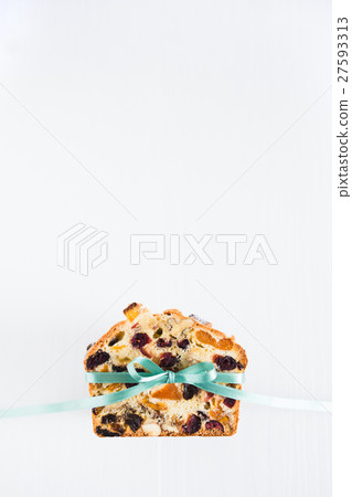 Homemade cake of dried fruits and nuts with bow 27593313