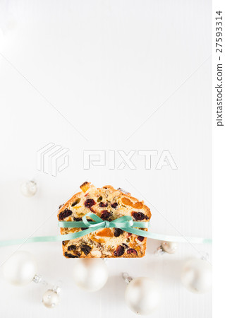 Homemade cake of dried fruits and nuts with bow  27593314