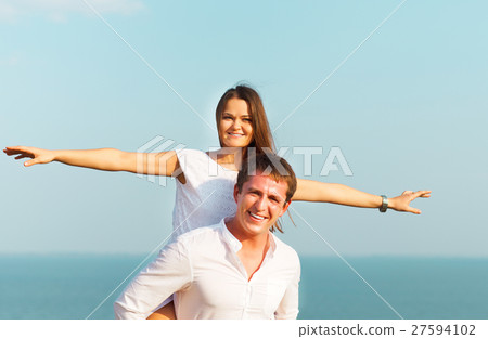 Young happy couple in love Young happy couple in love 27594102
