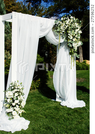 Large white bouquet with greenery stands  27596252