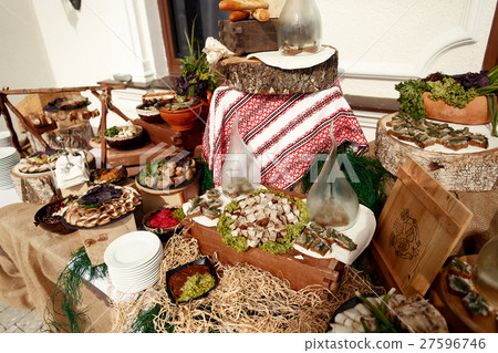 Dinner table decorated with wooden blocks  27596746