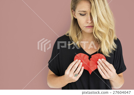 Girl Holding Broken Heart Concept 27604047