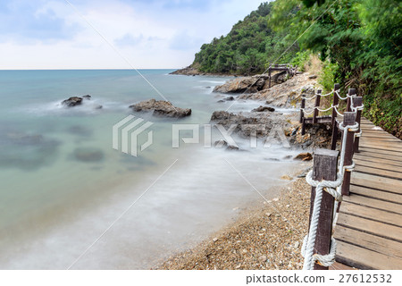 Long exposure shot. Sea scape with stone beach Long exposure shot. Sea scape with stone beach 27612532
