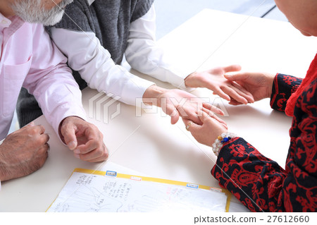 Fortune teller seeing the hands 27612660