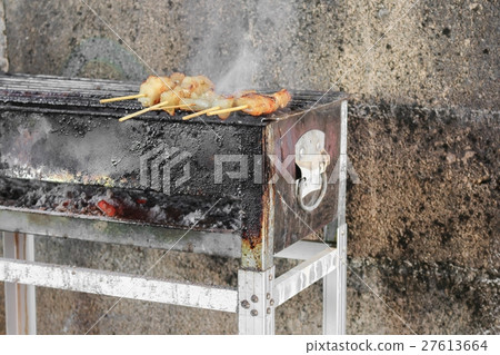 pork  cook grill  in thai style with fire smoke 27613664