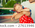 Happy brother and sister playing in park. 27613946