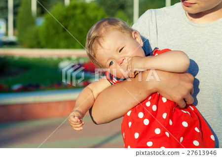 Happy brother and sister playing in park. 27613946