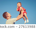 Happy brother and sister playing in park. 27613988
