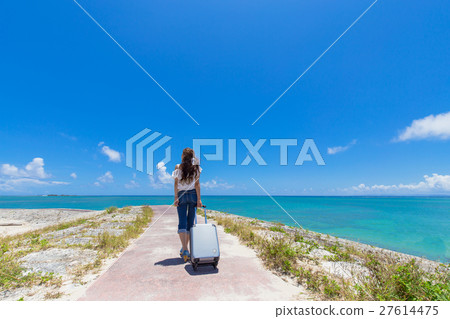 The sea of Okinawa and a young lady 27614475