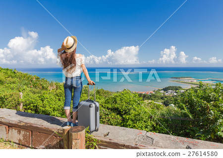 The sea of Okinawa and a young lady 27614580