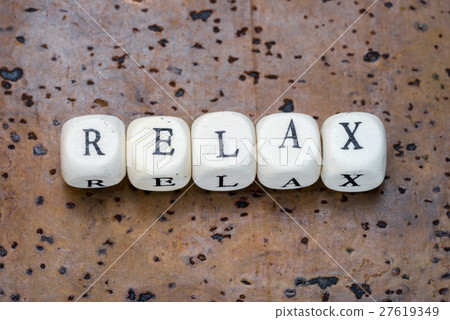 Relax text on wooden cubes 27619349
