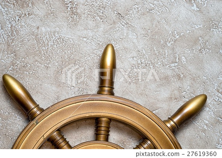 The wheel on a beige background  27619360