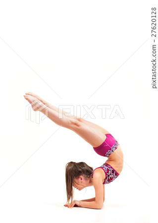 The teenager girl doing gymnastics exercises The teenager girl doing gymnastics exercises 27620128