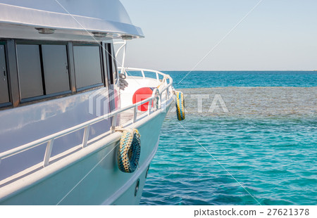 white yacht moving forward 27621378