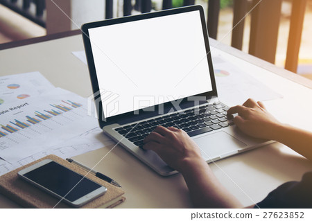 Business woman working on laptop. Business woman working on laptop. 27623852